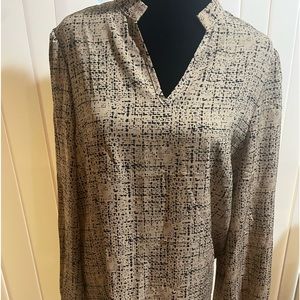 Tan and black print blouse
